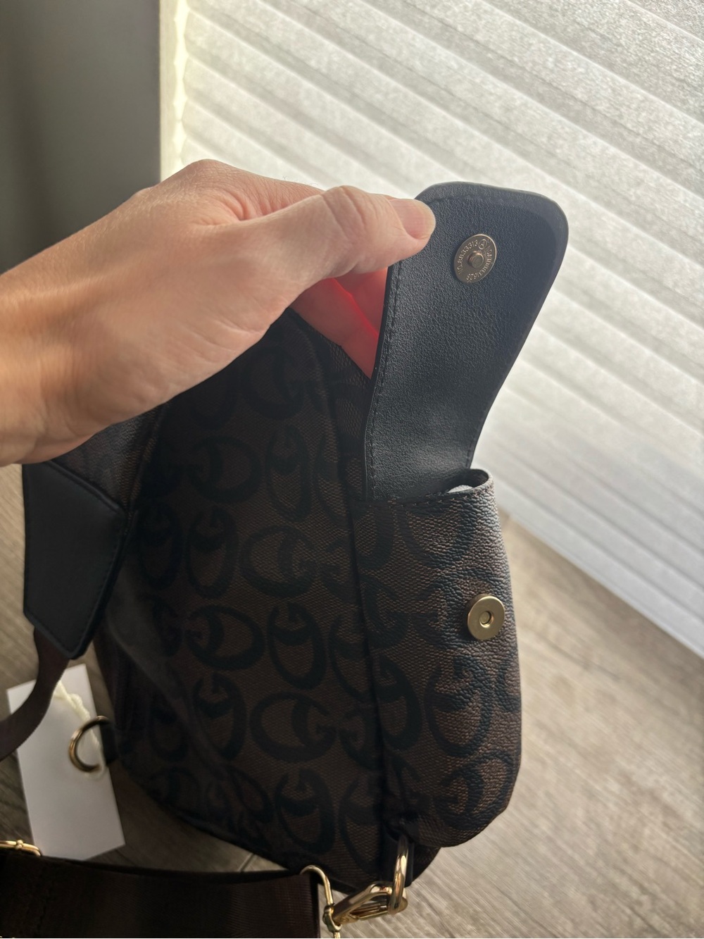Brown Sling Backpack with Signature Pattern - Picture 7 of 8